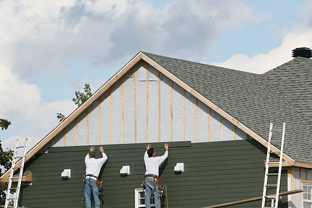 Professional Siding Repair technician working in Fort Bragg, NC